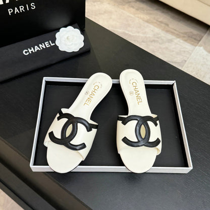 Mules "Rivoli" — Édition Signature